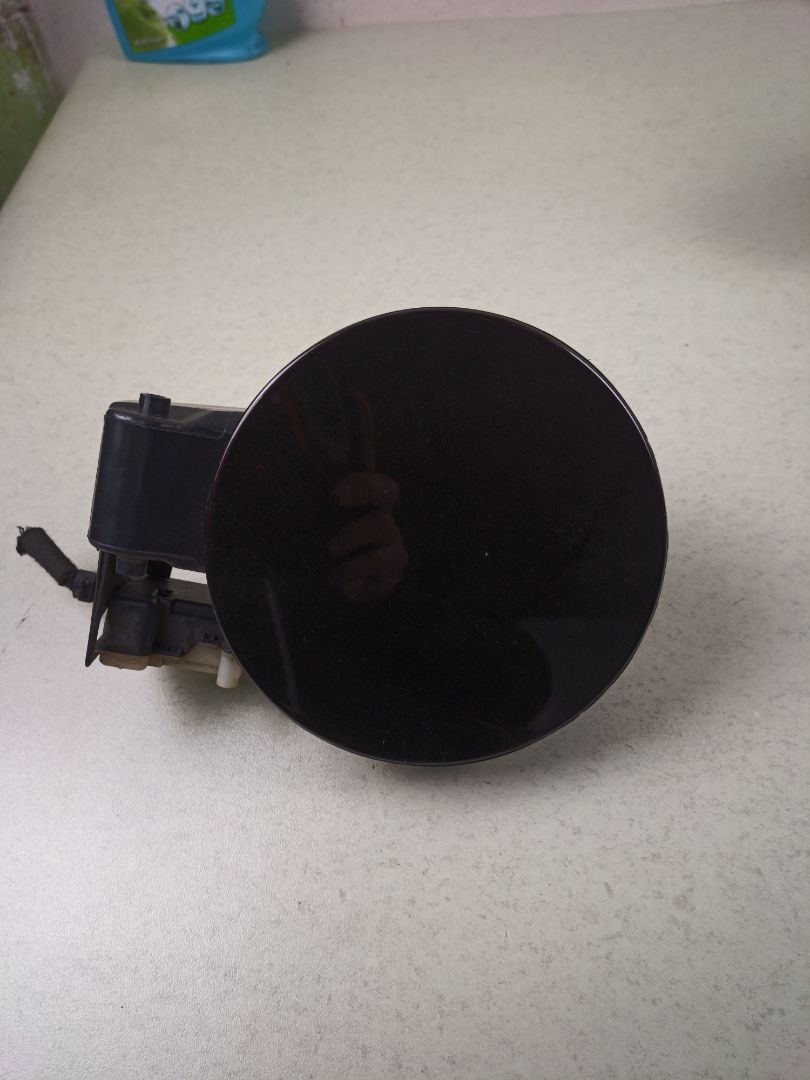 TAPA EXTERIOR COMBUSTIBLE