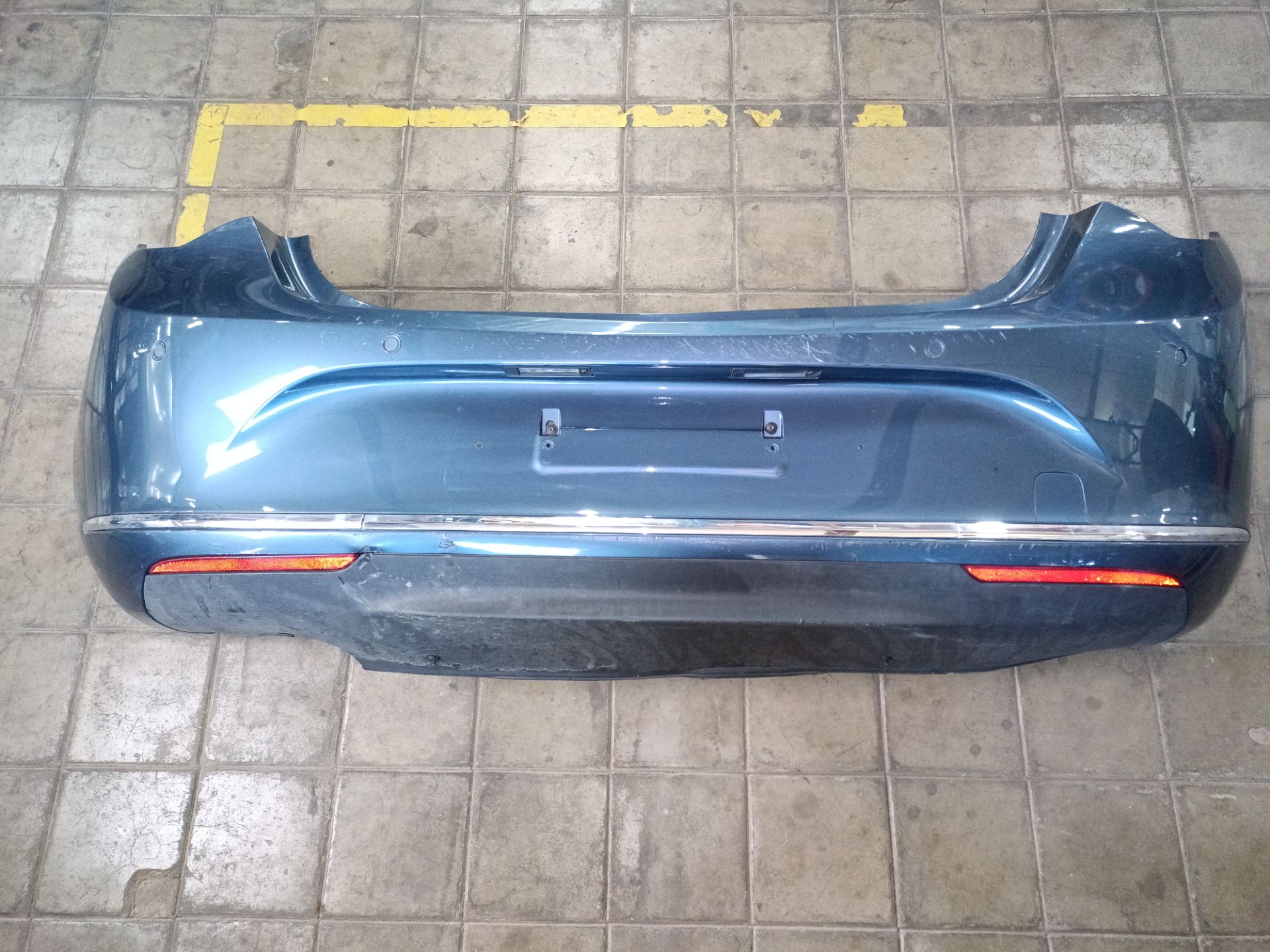 PARAGOLPES TRASERO Opel Astra J Berlina 5p