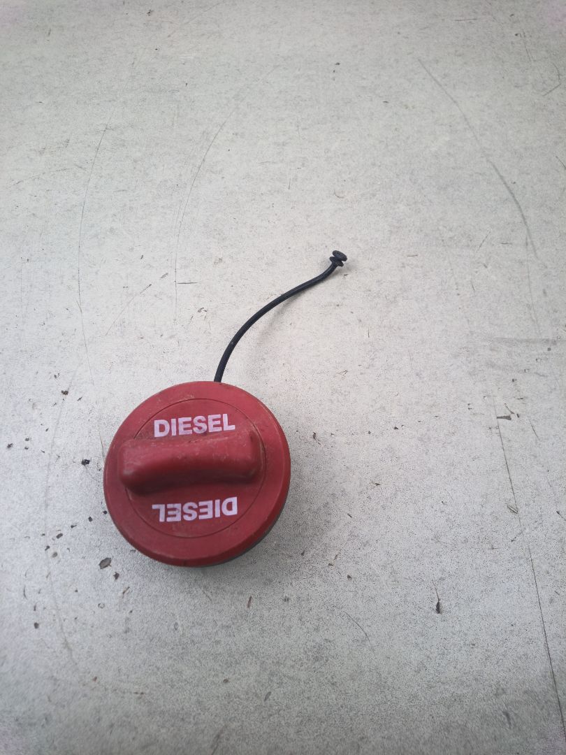 TAPON COMBUSTIBLE