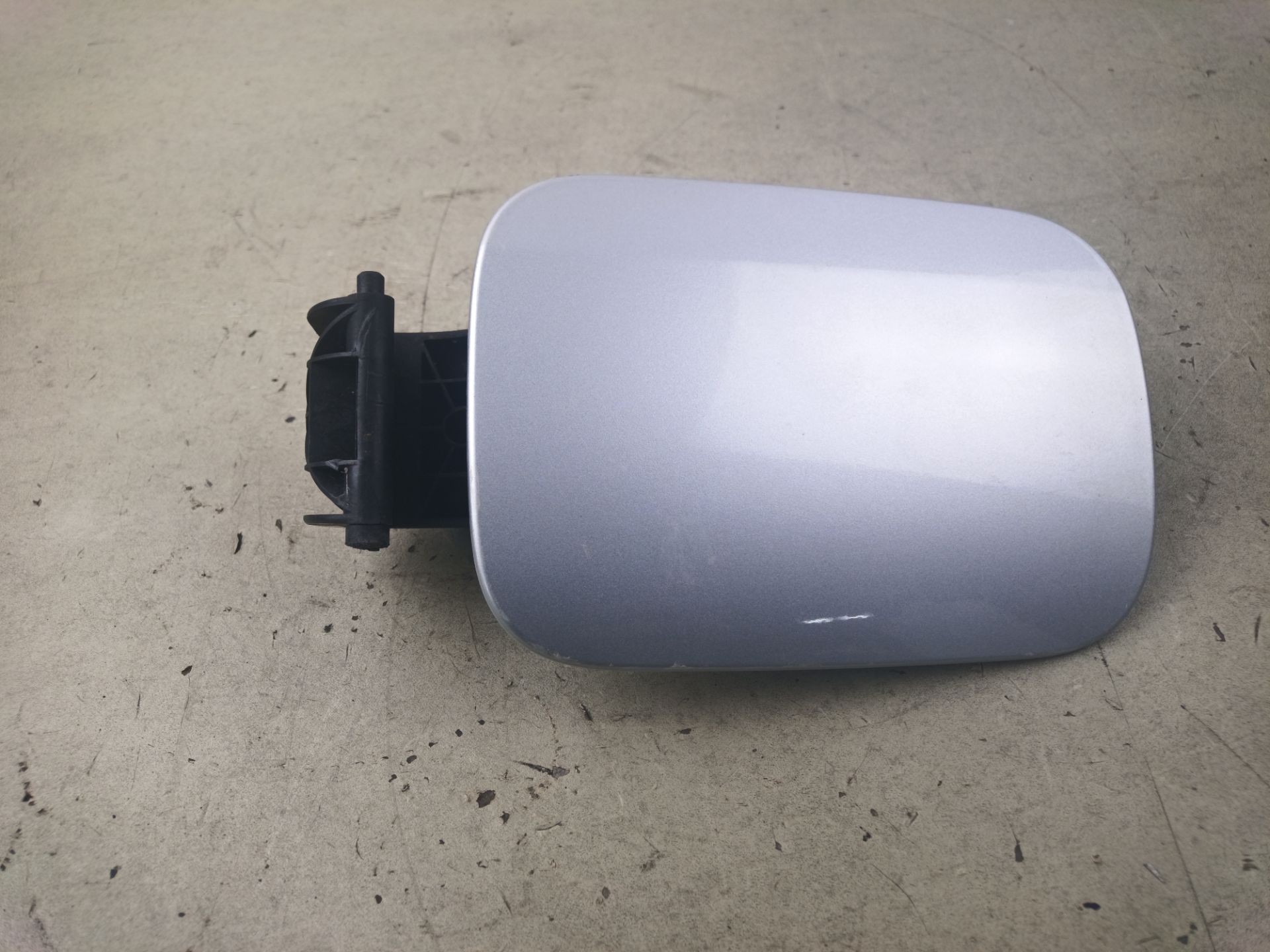 TAPA EXTERIOR COMBUSTIBLE