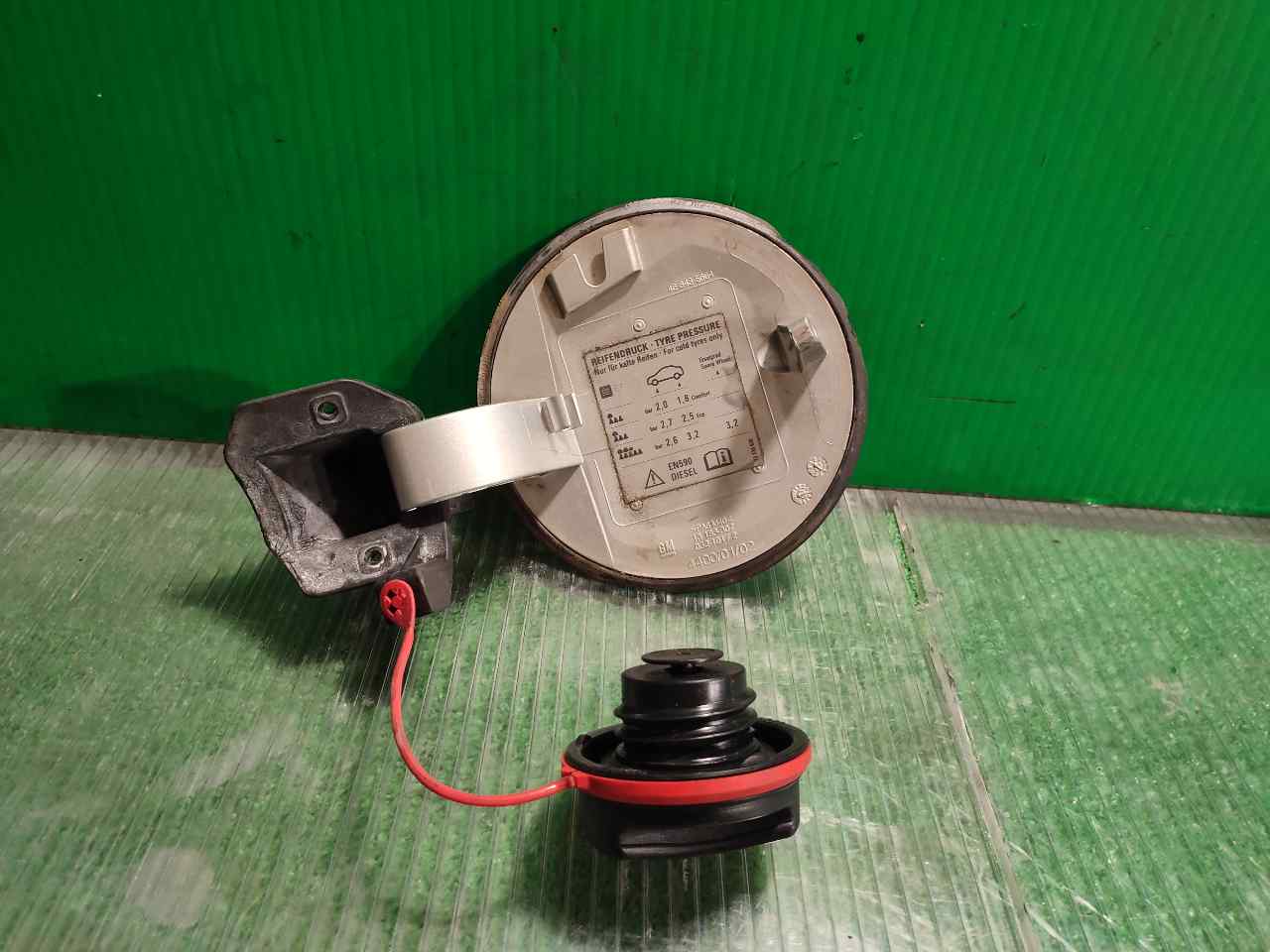 TAPA EXTERIOR COMBUSTIBLE