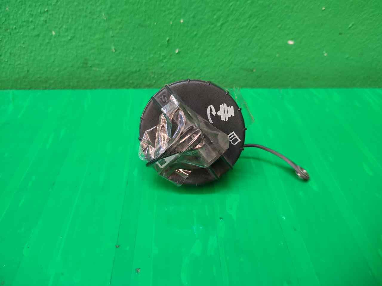 TAPON COMBUSTIBLE