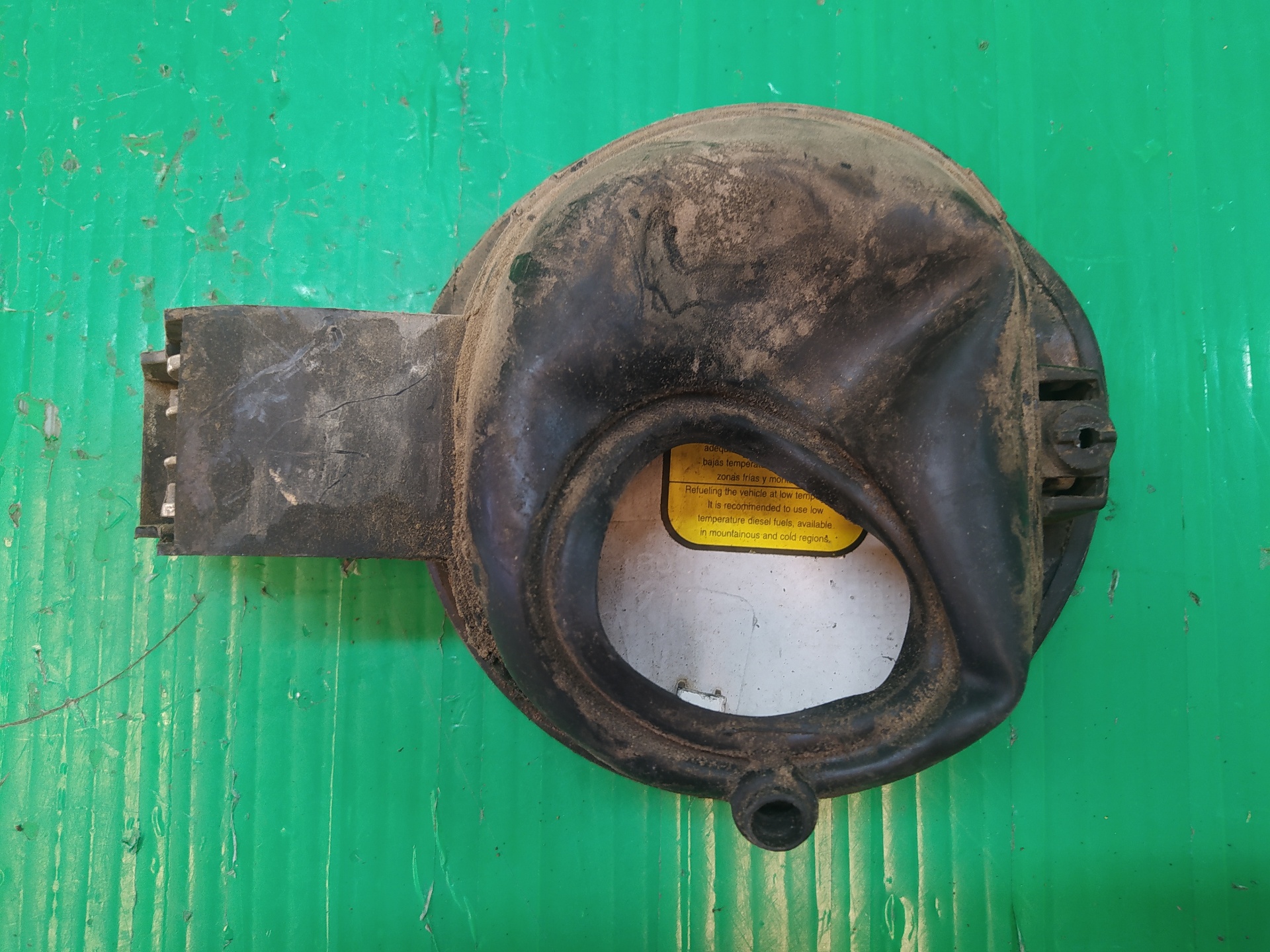 TAPA EXTERIOR COMBUSTIBLE
