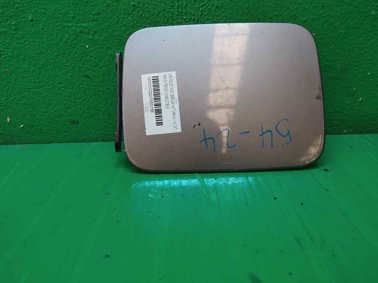 TAPA EXTERIOR COMBUSTIBLE