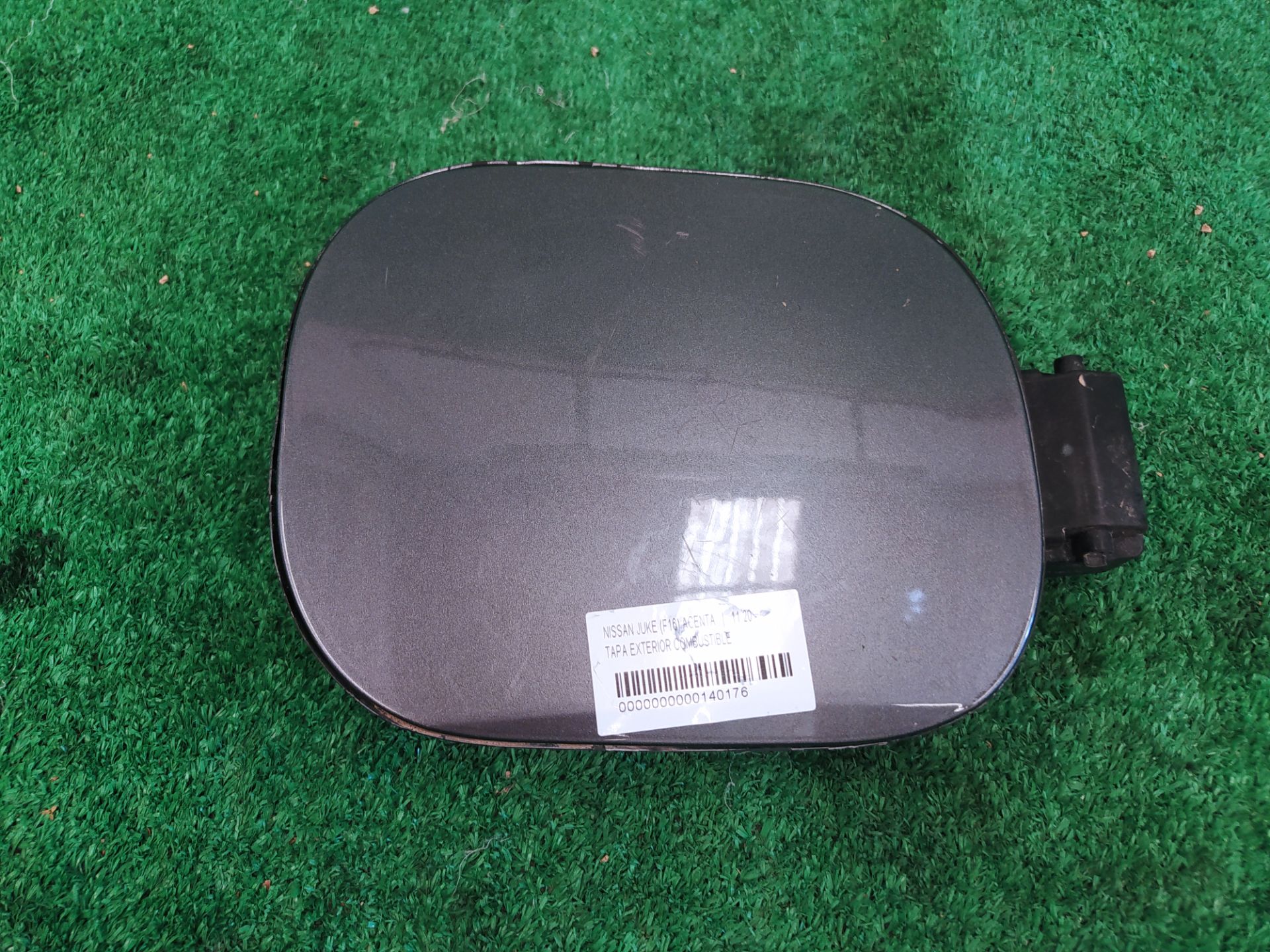 TAPA EXTERIOR COMBUSTIBLE