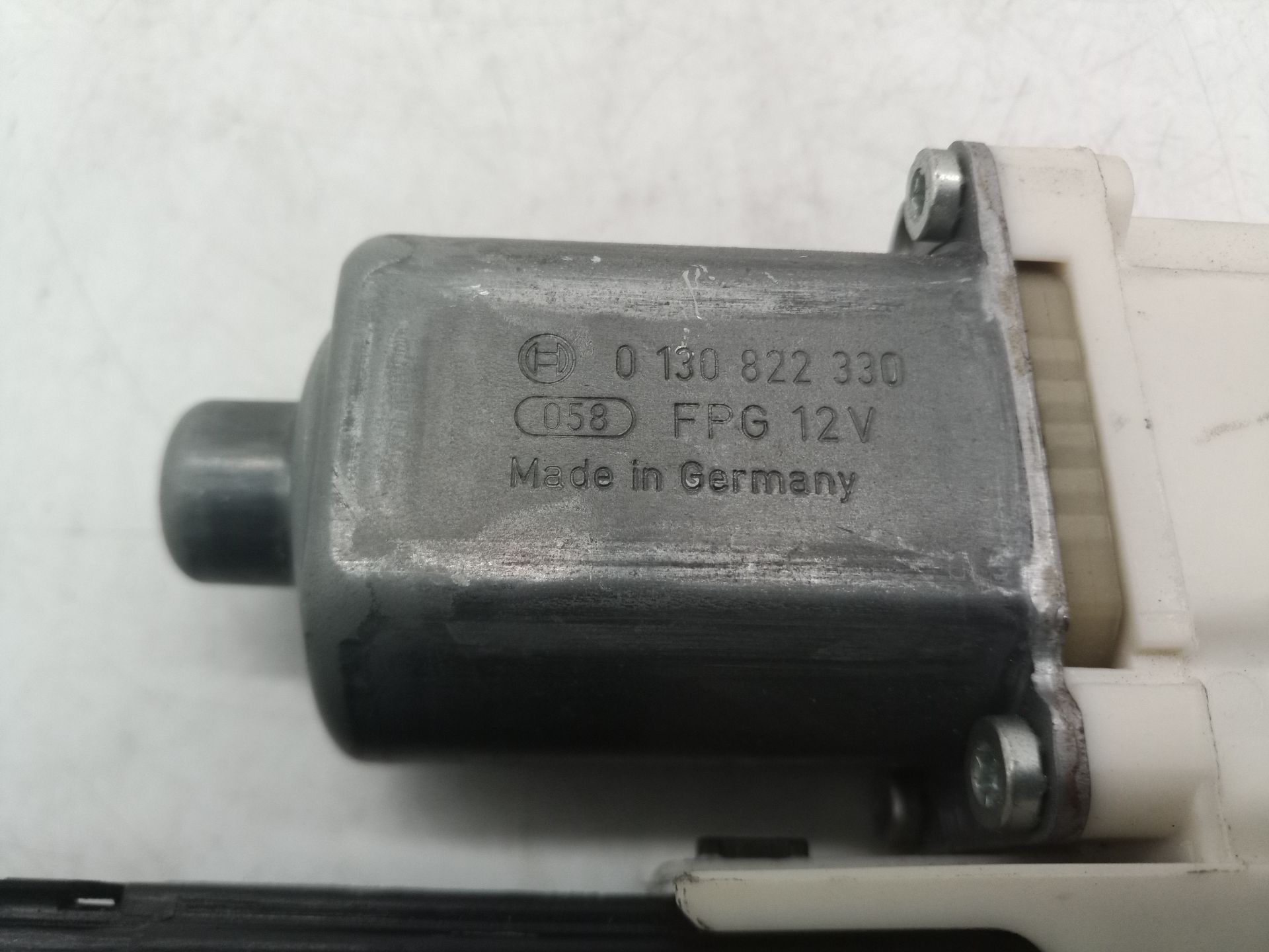 0130822330 MOTOR ELEVALUNAS DELANTERO IZQUIERDO RENAULT LAGUNA 2010 11669 devimagesvext/08283e45-1ba6-4c70-9a92-5b0ff35685bb/migcrv/imagenes/000/000/652/000000652856.jpeg